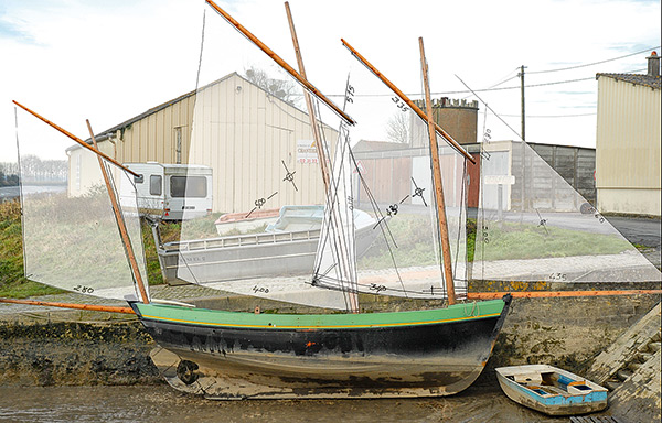 Photo bateau à sec et voilure imagée